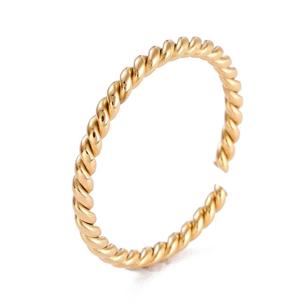 a gold open cuff ring on a white background