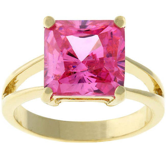 Large pink stone gold plated ring on white background